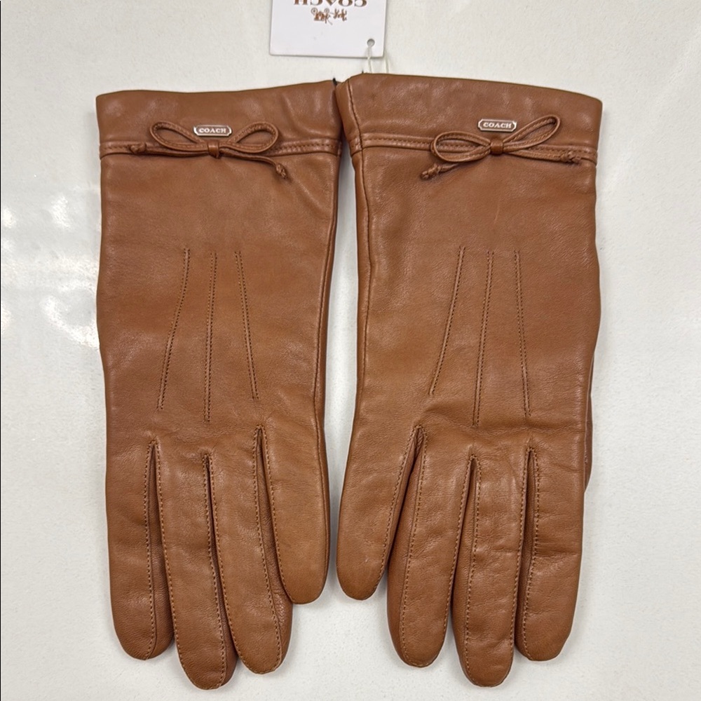 Coach Brown Leather Gloves with Decorative Bow and Tailored Fit